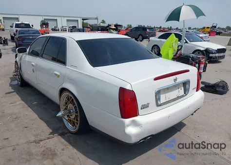 2004 Cadillac Deville Dhs z USA, uszkodzony, nr VIN 1G6KE57Y64U256745
